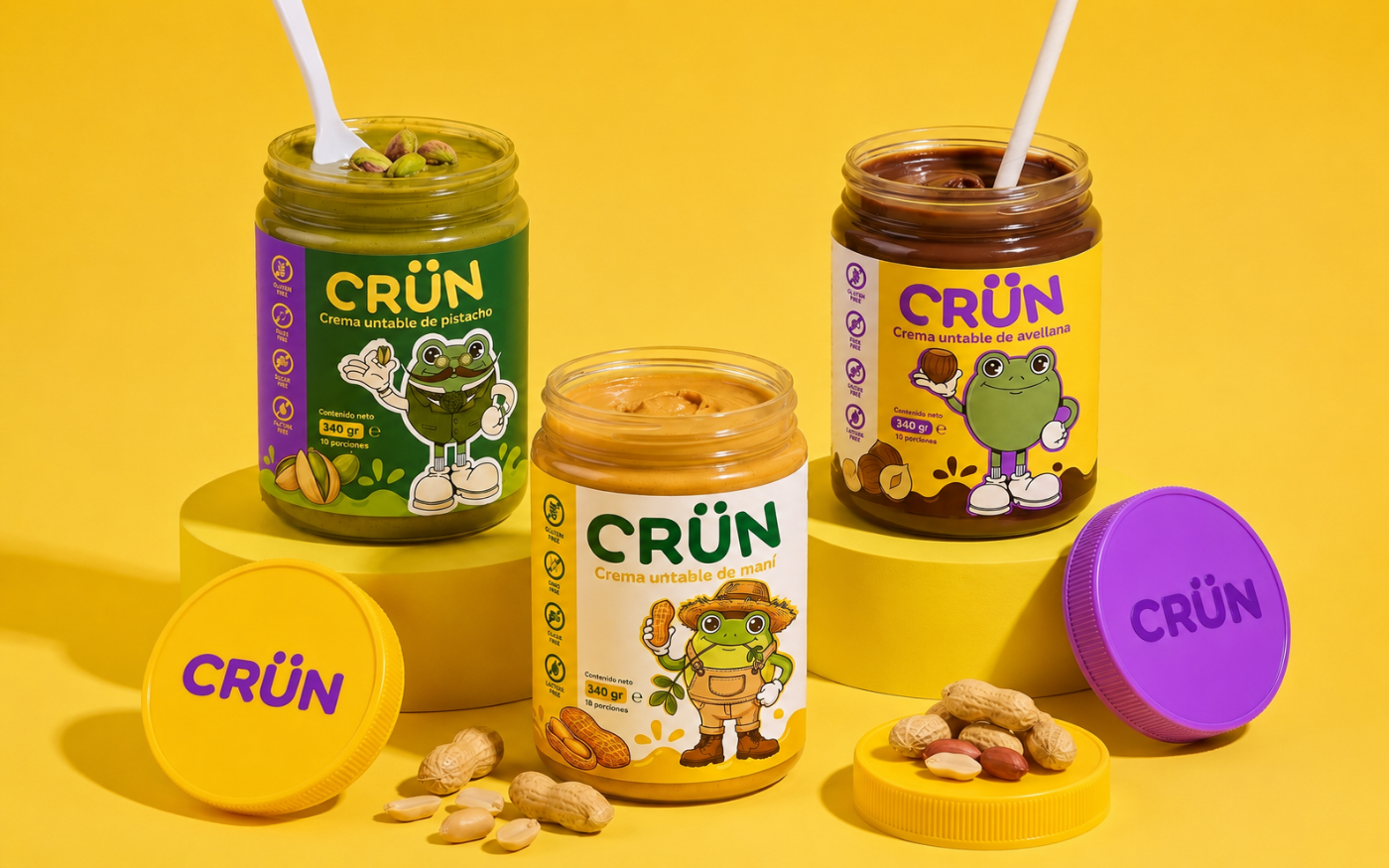 Identidad visual y packaging de Crün: frascos de crema de pistacho, maní y avellana con sus ranas mascota